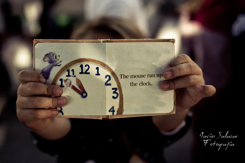 The mouse ran up the clock